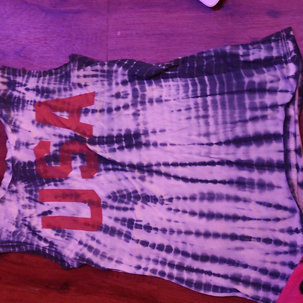 A red white and blue muscle tee